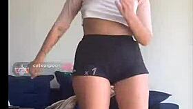 bouncing blonde titties in shorts and bra during workout