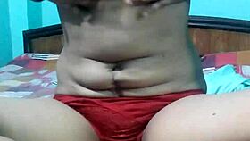 kavita feels excited removing her dress on webcam.