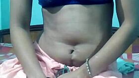 kavita feels excited removing her dress on webcam.