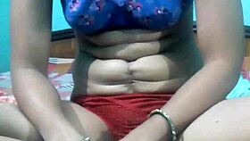 kavita feels excited removing her dress on webcam.