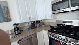 Stepbrother and Athena Faris have fun in the kitchen with her dress on.