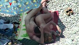 Beach voyeur catches mature couple banging under bright sun
