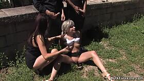 handcuffed blonde sucking dicks outdoor in public
