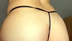 Trying on panties close up.