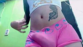 Transsexual babe in pink undies masturbating on cam