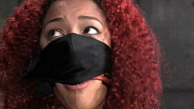 mixed girl screams 'ahh, the caning hurts so much!' in bondage