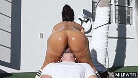 The huge butt latina milf gives blowjob outdoor with athletic guy.