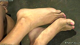 mixed girl screams 'ahh, the caning hurts so much!' in bondage