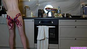 i feel so emotional watching this naked housewife with octopus tattoo on ass cook dinner in the kitchen