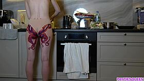 i feel so emotional watching this naked housewife with octopus tattoo on ass cook dinner in the kitchen