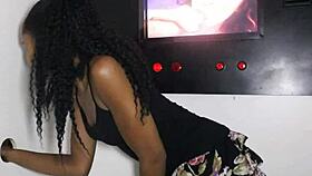 Beautiful petite ebony hottie with small tits and nice ass blowing strangers in glory hole.