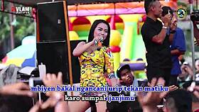 Indonesian singers perform wild erotic dance on stage with men