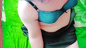 this cute bbw sissy crossdresser in pink shirt and black mini skirt shows off her big butt on webcam