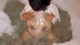 latina girl gets wet using vibrator on ass and tits