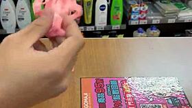 Asian ladyboy teases with new thong in convenience store