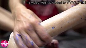 babe gives sensual footjob with rubber cock fetish