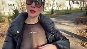 Wow, this beauty flashes her big boobs while walking in a public park!