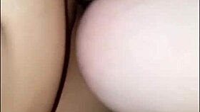 In this homemade video, an ebony fat milf gets fucked by a white lesbian using a strapon