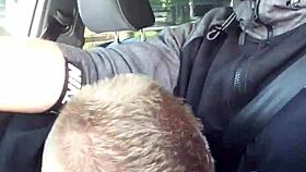 She gropes his monster cock in the car during traffic, getting caught in a quickie tease.