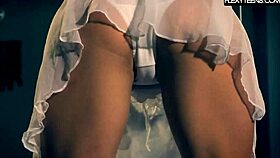 Amateur ballerina teases in a white dress, showing flexible naked body.