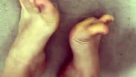 Hungarian Babe Sheds Nylon for Steamy Shower Footjob