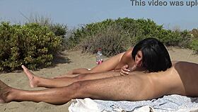 Hey, watch this amateur milf get creampied on a public beach