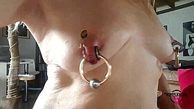 Nippleringlover Horny Milf Sticking Tattoos on Huge Pierced Nipples?