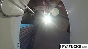 Leya Falcon uses the tub shower head on her ass