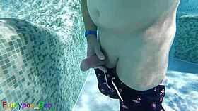 Gay guy jerks fat cock in public thermal pool underwater fun