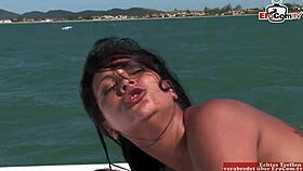 Black haired beauty enjoys a hot anal threesome on a boat
