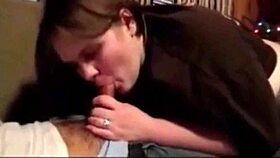 Wife deepthroat husband dick on christmas for her gife wihe her swallowing mouth full with big tits