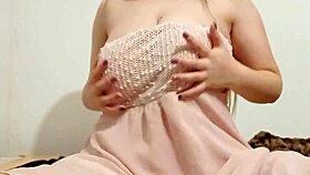 she fondles her big breasts