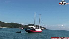 Black haired beauty enjoys a hot anal threesome on a boat