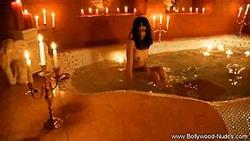 Erotic brunette cougar dances nude