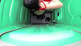 blowjob and swallow at porta gloryhole in outdoor construction site.