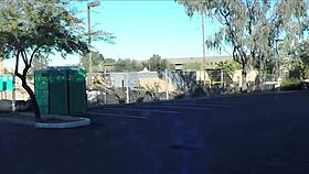 blowjob and swallow at porta gloryhole in outdoor construction site.