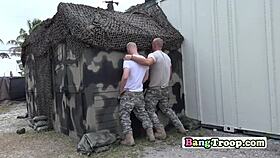 superior officer orders soldiers to shove junk in tight hole