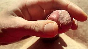 edging from flaccid and playing with precum natural light!