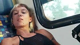 my friend and i travel on a train with people around.