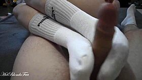 Blonde Miley Grey Gives Intense Footjob In Long Socks