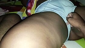 My stepfather gently caresses my chubby cheeks during a family gathering.