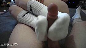 Blonde Miley Grey Gives Intense Footjob In Long Socks