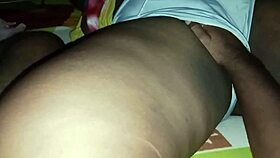 My stepfather gently caresses my chubby cheeks during a family gathering.