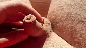 edging from flaccid and playing with precum natural light!