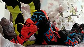 Gay biker treads boots in motocross