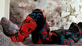 Gay biker treads boots in motocross