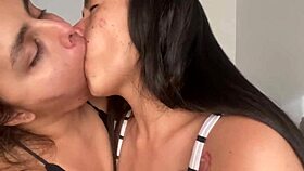 She teaches her stepsister how to kiss and lick big tits