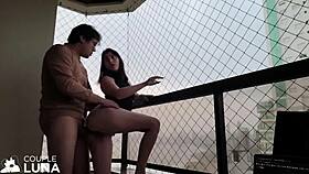 Naughty wife sucks big dick and gets pussy fucked on balcony for cum inside in public