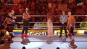 roman reigns battles cody rhodes for wwe title