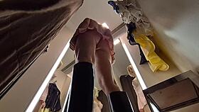 Can you spot the hidden camera in the dressing room as she tries on sexy clothes?